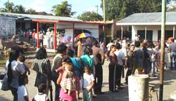 people waiting in line for eye exams in Honduras